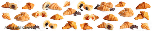 Fotomural Set of delicious fresh baked croissants on white background