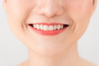 © makistock - close up Asian girl with Red lip with white background beauty and fashion concept