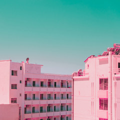 Sticker - Houses of the seaside town. Tropical and exotic location. Infrared pink style.