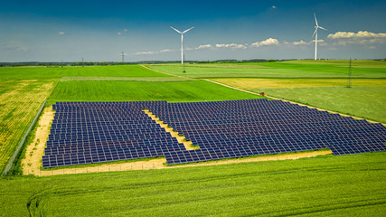 Wall Mural - Solar panels and wind turbines, aerial view of Poland