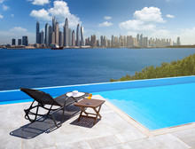 Awesome View Of The Dubai Marina From The Infinity Pool With A Deck Chair