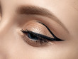 Closeup of beautiful woman eye with fashion makeup