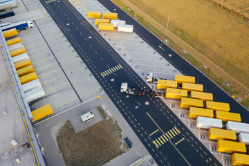 Wall Mural - Aerial view of the distribution center, drone photography of the industrial logistic zone.