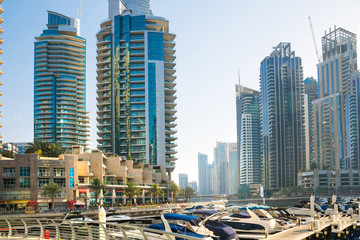 Sticker - Dubai, UAE United Arabs Emirates. Dubai marina skyscrapers and yachts at sunset. Apartments, hotels and office buildings, modern residential development of UAE