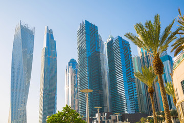 Sticker - Dubai, UAE United Arabs Emirates. Dubai marina skyscrapers and yachts at sunset. Apartments, hotels and office buildings, modern residential development of UAE