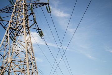 Wall Mural - High-voltage metal tower against the sky