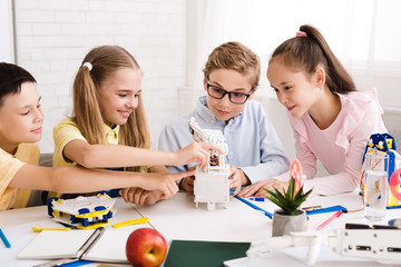 Poster - Stem education. Children creating robots at class