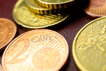 closeup of a metal coin with a value of two cents