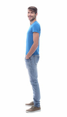 Wall Mural - side view . modern young man in jeans.