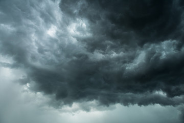 Wall Mural - black cloud and thunderstorm before rainy, dramatic black clouds and dark sky