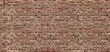 Brick texture. Panoramic background of wide old red brick wall texture. Home or office design backdrop