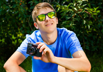 Canvas Print - Young Man with a Camera