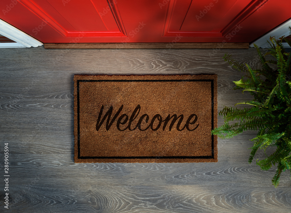Overhead view of welcome mat outside inviting front door of house - obrazy, fototapety, plakaty 