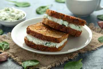 Wall Mural - Ricotta cheese spinach sandwich with coffee. healthy breakfast