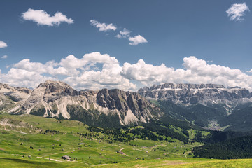 Wall Mural - Scenery Alps with green mountain hill under sky