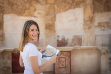 Young Woman Exploring The Ruins Of Masada In Israel