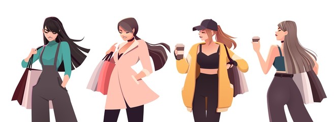 set of beautiful young girls in fashion clothes with shopping bags. stylish fashion women. shopping 
