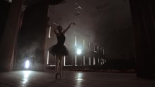 A Ballerina Dances In A Hall With Empty Seats. A Female Dancer Enjoys The Quiet Of An Empty Scene And No Audience.