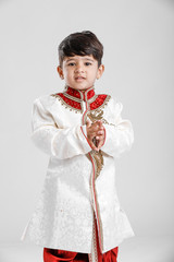 Canvas Print - Cute Child in ethnic wear and giving multiple expression 