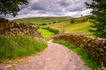 Bridleway In Upper Swaledale, One Of The Most Northerly Dales In The Yorkshire Dales National Park, Famous For Its Wildflower Meadows, Field Barns And Dry Stone Walls