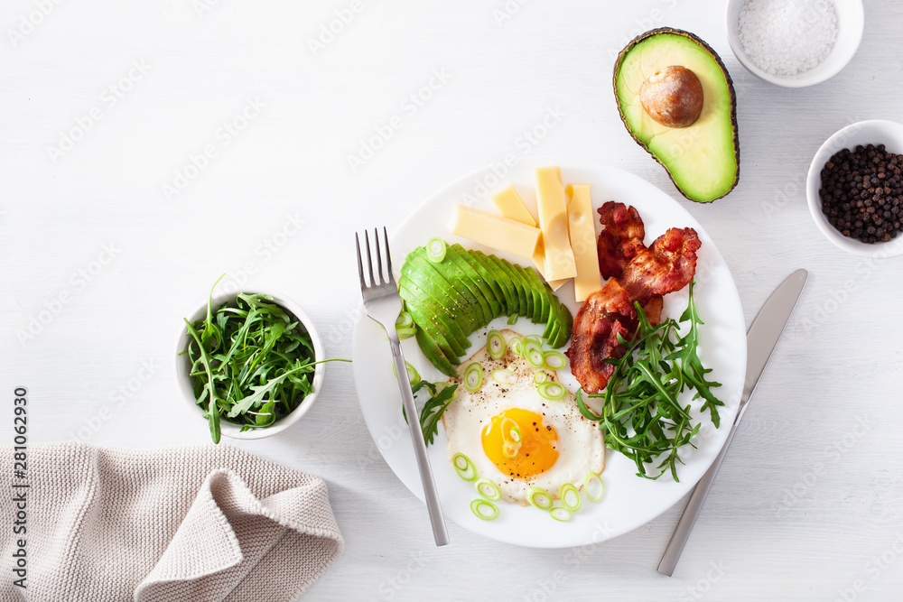 healthy keto breakfast: egg, avocado, cheese, bacon - obrazy, fototapety, plakaty 