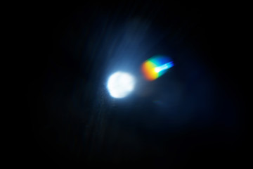Aufkleber - Lens Flare. Light over black background. Easy to add overlay or screen filter over photos. Abstract sun burst with digital lens flare background. Gleams rounded and hexagonal shapes, rainbow halo.