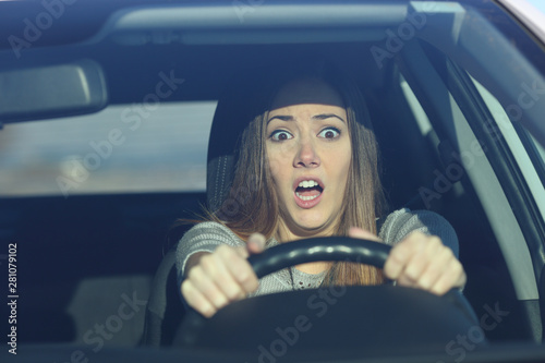 Fotomural Scared driver driving a car before an accident
