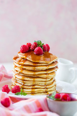 Wall Mural - Homemade pancakes with maple syrup and  raspberries