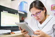 © Per Swantesson/Stocksy - A nurse student using a tablet