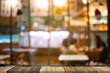 © mutarider15 - Blurred wooden table in front blurred night street market with bokeh abstract background, copy space for presentation product