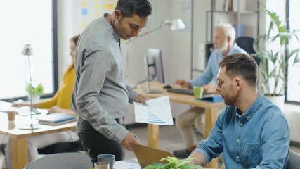 Poster - Modern Startup Chief Analyst Works on a Firm Strategy, Talks with Software Developer, Looks at Documents Showing Statistics, Graphs and Charts, Corrects them with Pen, Analyzes Data and Information. D