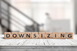 Downsizing message sign made of wood
