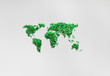© Beatrix Boros/Stocksy - Green world map on white paper background
