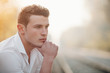 © Mika Knezevic/Stocksy - Close up of thoughtful young man