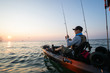 © Colin - Young Man Kayak Fishing at Sunrise in Canada
