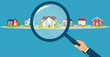 Vector of a businessman hand holding magnifying glass searching for the best real estate house deal