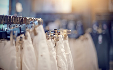 Clothes on hangers in shop