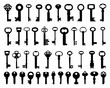 Set of black silhouettes of door  keys on a white background