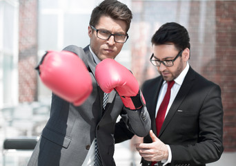 Wall Mural - young businessman is preparing to meet with a competitor