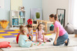 © Pixel-Shot - Cute little children learning letters in kindergarten