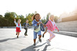 © Pixel-Shot - Group of running children outdoors