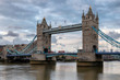 © lucky-photo - London Tower Bridge in evening with dramatic sky, London UK.