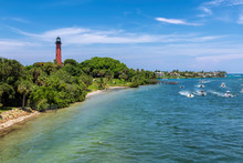 Beautiful View Of The Jupiter Lighthouse And Boats On The Sea In Palm Beach County, Florida.