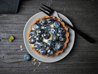 Sticker - blueberry tart on dark wooden table