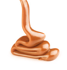 Sticker - Pouring sweet caramel sauce on white background