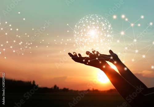 Cuadros en Lienzo Man hands holding global network and data customer connection on nature background