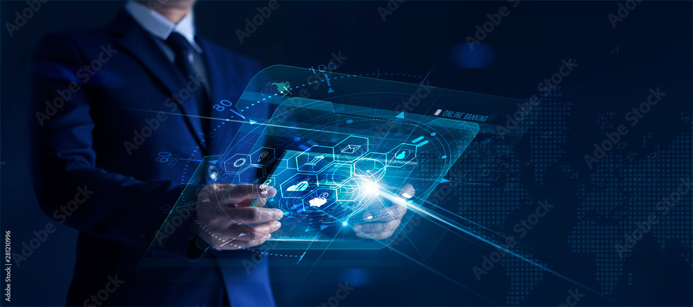 Businessman holding modern virtual interface banking in hand with icon network connection, shopping and mobile payment online on dark background - obrazy, fototapety, plakaty 