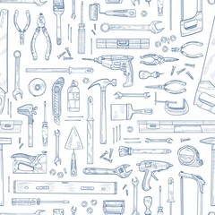 Monochrome seamless pattern with manual and powered household tools for woodworking. Backdrop with equipment for home repair hand drawn with contour lines on white background. Vector illustration.