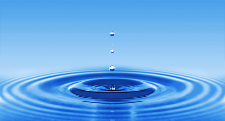 image of a water drop on a blue background.