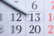 © fortton - Friday the 13th on the calendar. Circled number 13 on paper calendar.